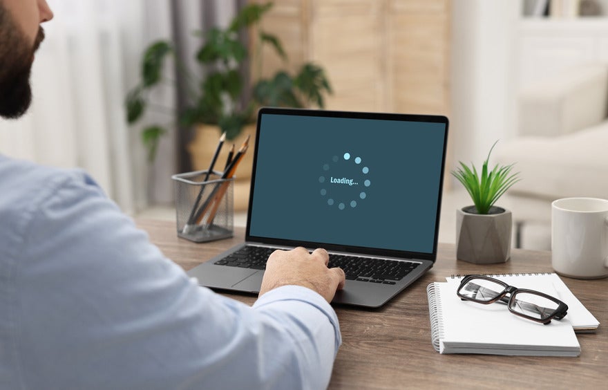 Free page speed testing tools Laptop screen showing a loading icon