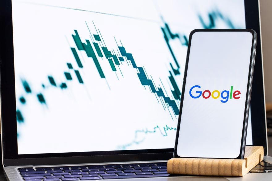 Google Marketing Live In App Image A smartphone on a stand with the Google logo on screen