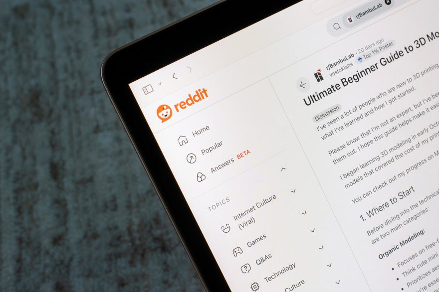 How to sign up for Reddit Laptop screen showing Reddit homepage