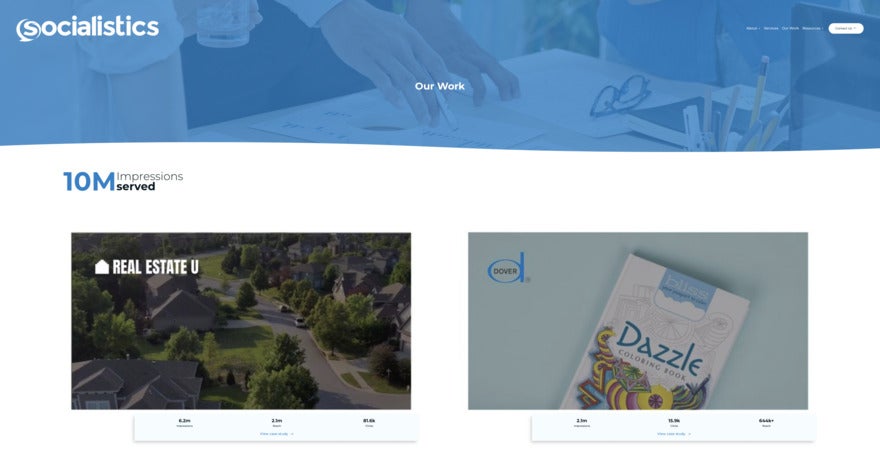 Socialistics Socialistics webpage with blue banner and 2 tiles - one with an aeiral photo of an area with trees, and another with a coloring book.