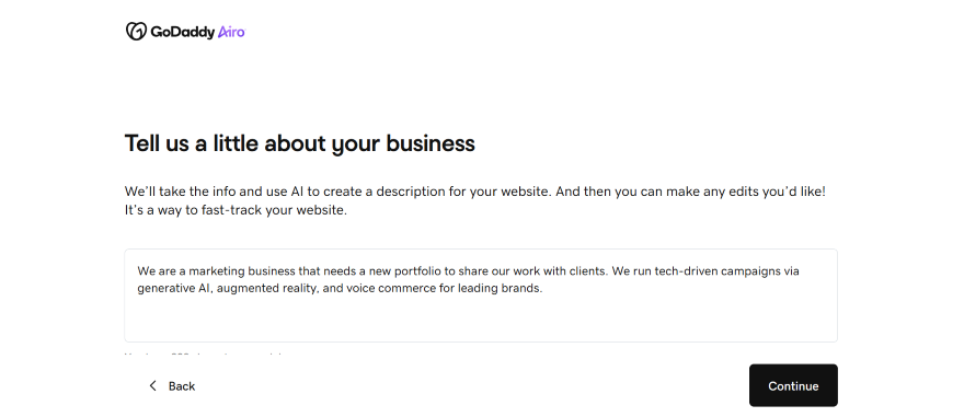 GoDaddy Airo WB Prompt GoDaddy Airo interface prompting users to describe their business for AI-generated website content, with an example provided.