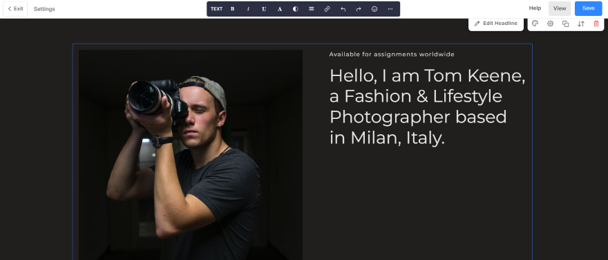 Pixpa Limited Customization A photographer poses with a camera in a dimly lit corridor, showcasing a professional lifestyle and creative identity.